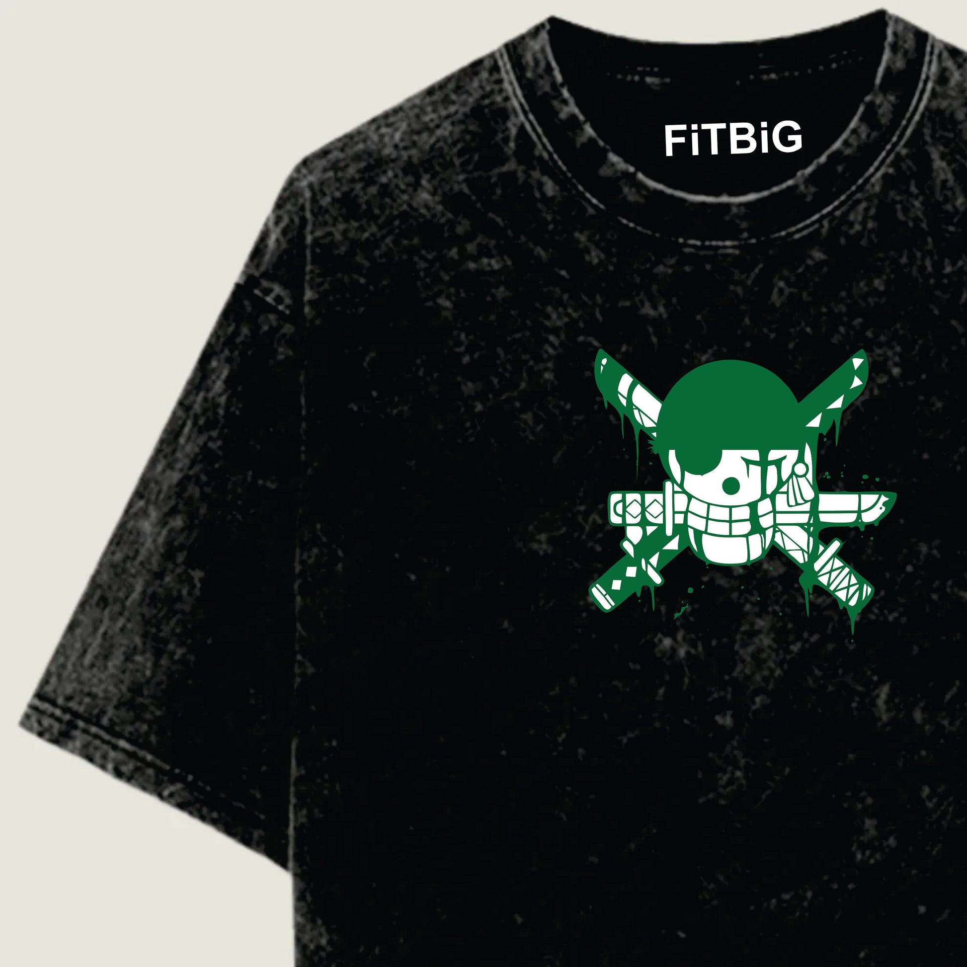 Black t-shirt with green graphic design and 'FiTBiG' branding on a beige background