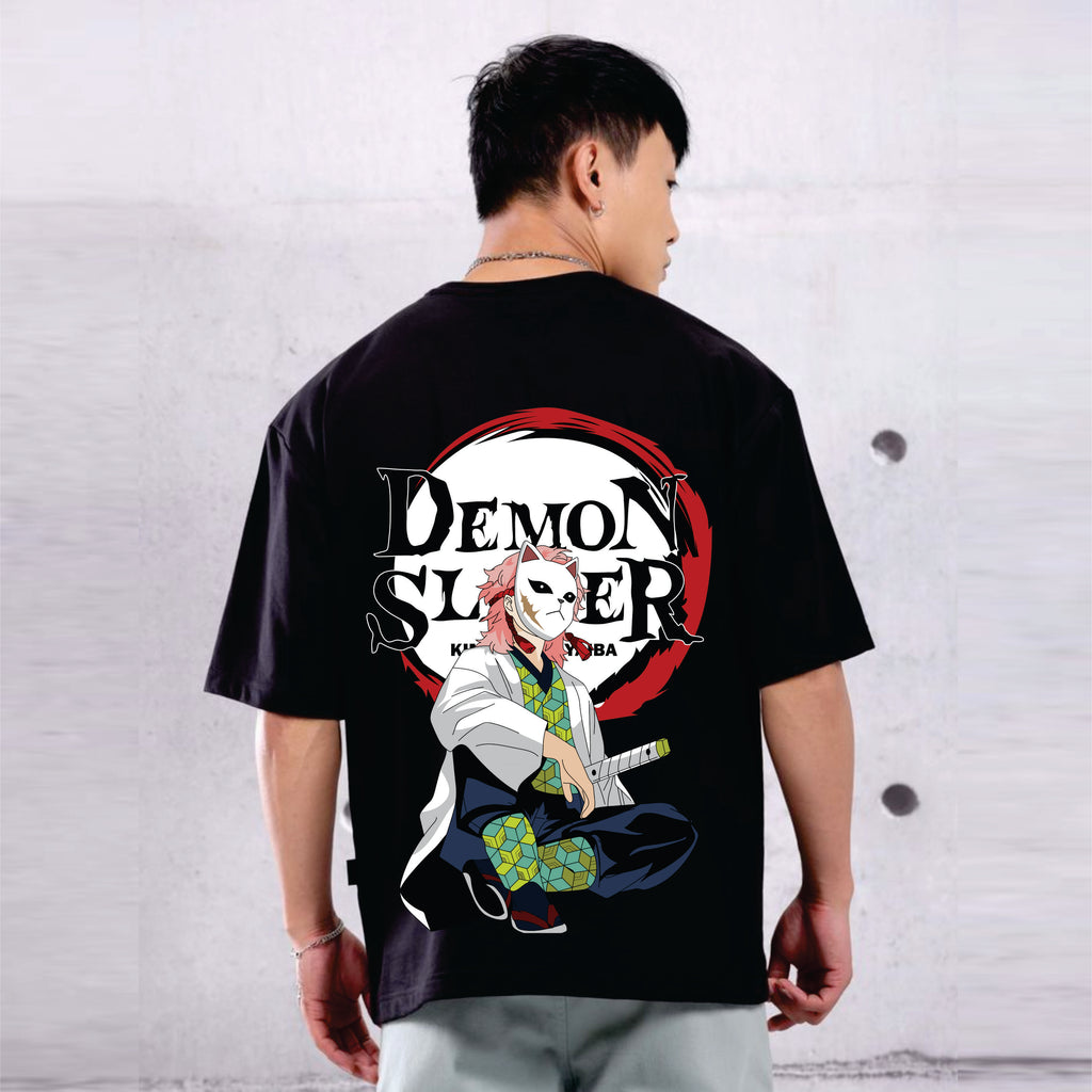 Person wearing a black t-shirt with 'Demon Slayer' graphic design on the back.