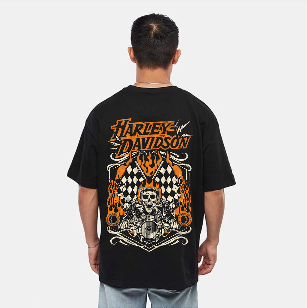 Person wearing a black Harley Davidson t-shirt with a graphic design on the back.