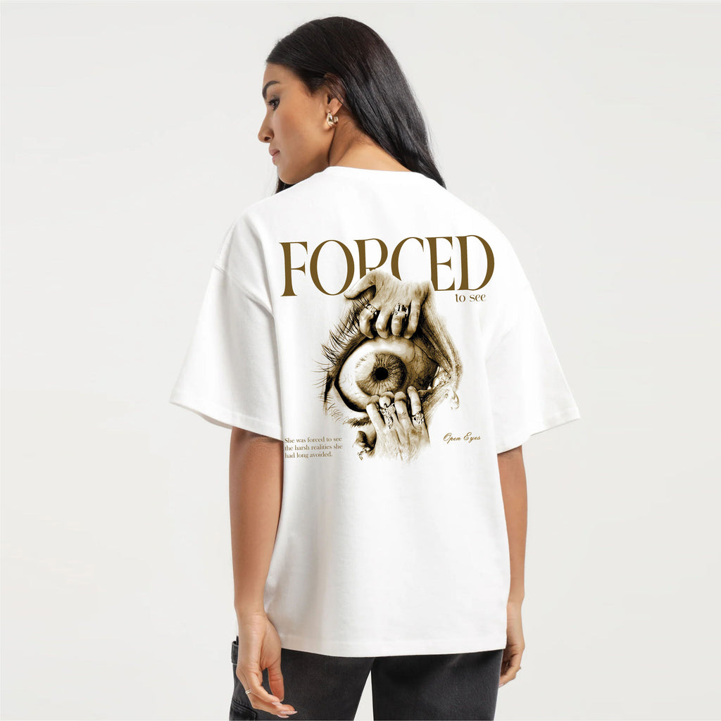 Person wearing a white t-shirt with a graphic design and text on the back