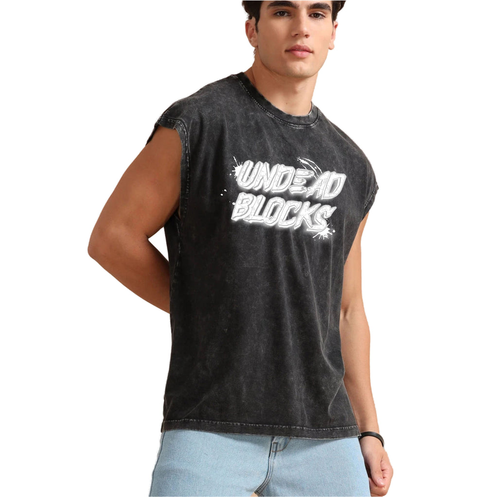 Man wearing a black sleeveless t shirt with 'Undead Blocks' text on a white background