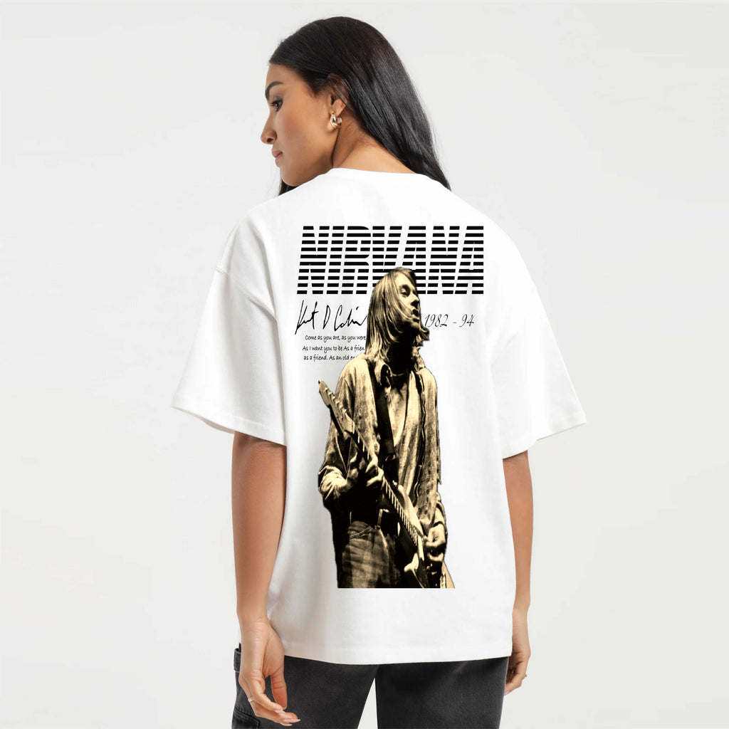 Person wearing a white t-shirt with a graphic design on the back