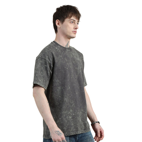 Man wearing a dark gray t-shirt on a white background