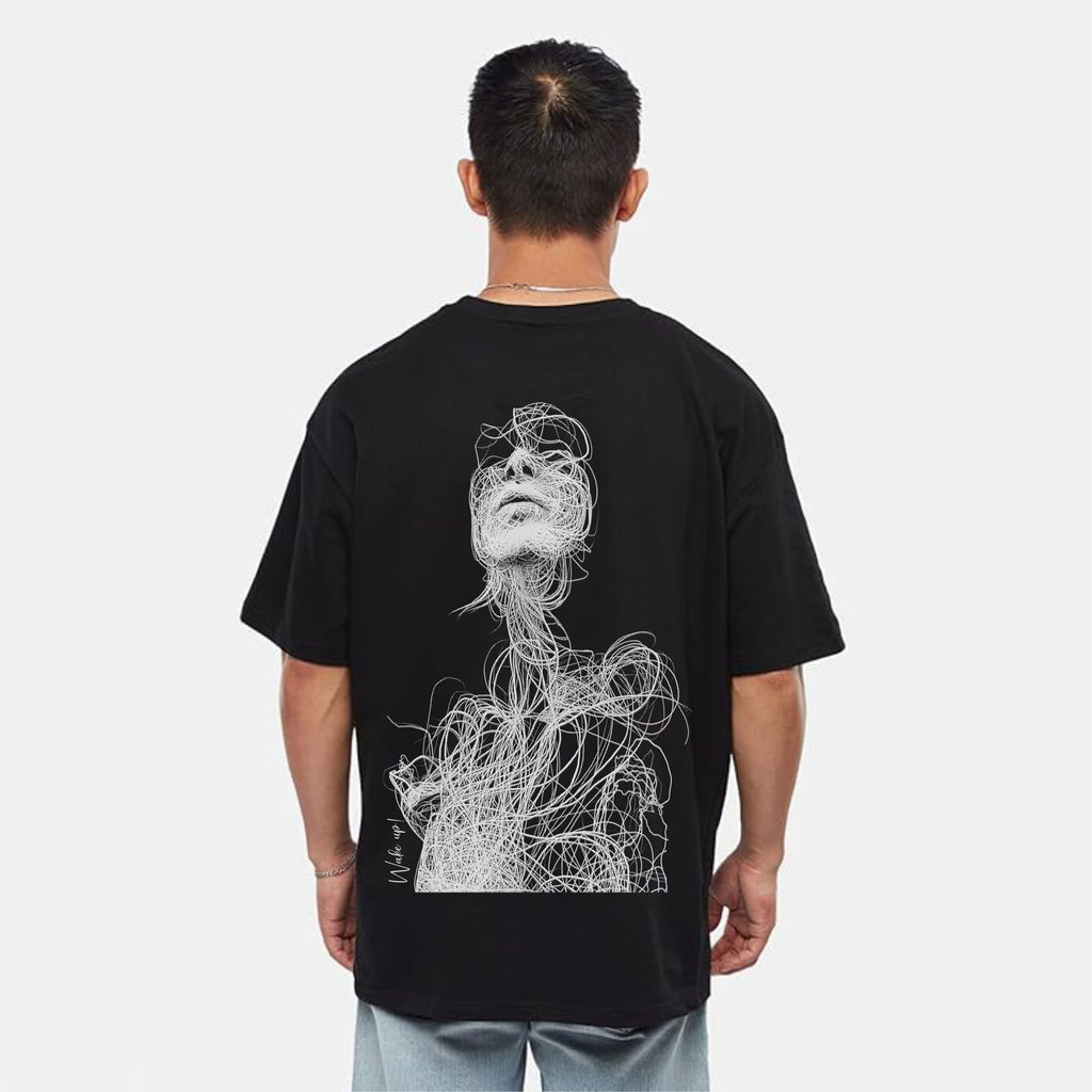 Person wearing a black t-shirt with a white graphic design on the back against a white background