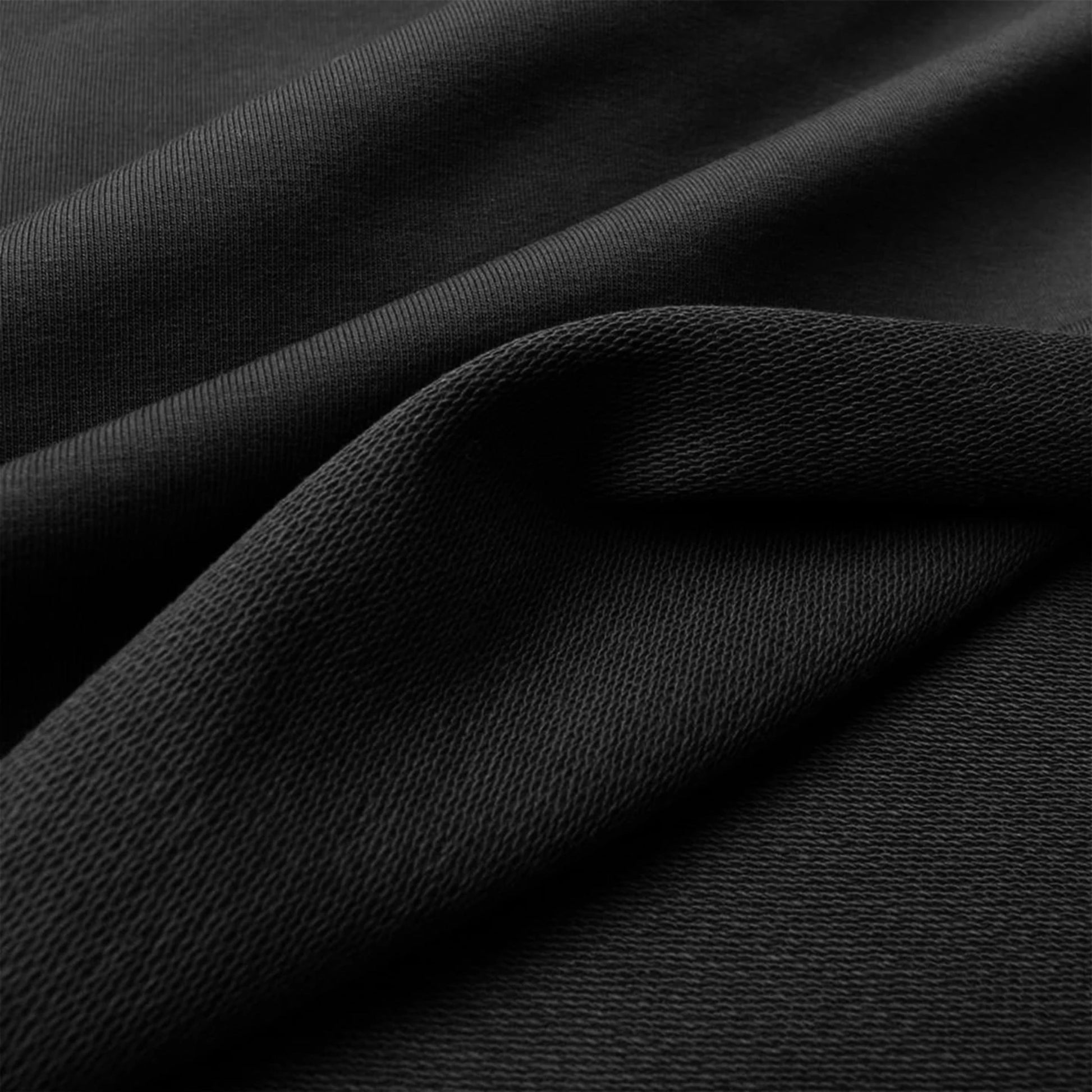Close-up of black fabric with a textured pattern