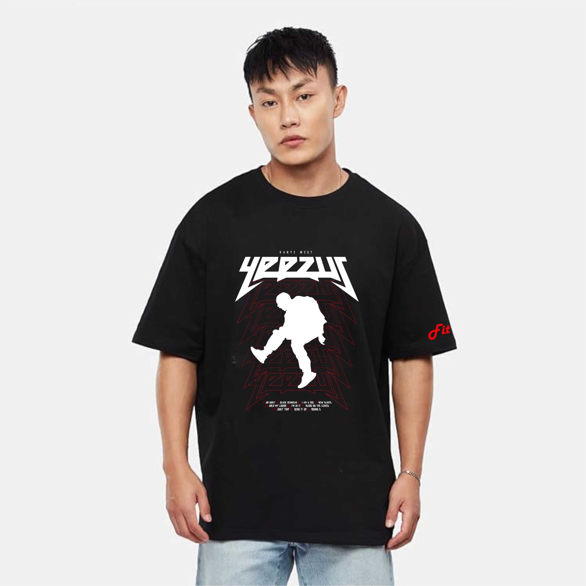 Person wearing a black t-shirt with a graphic design on a white background