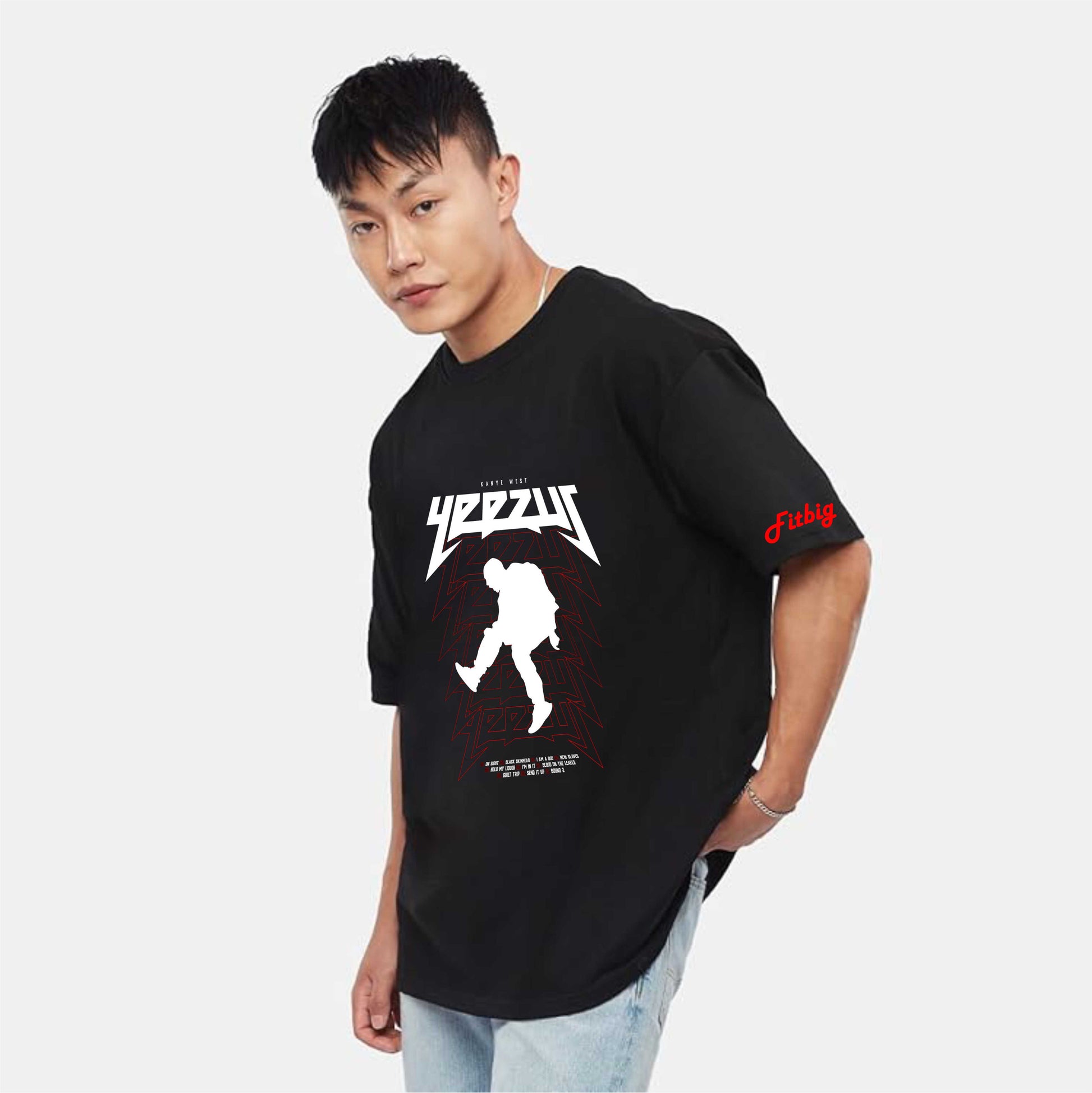 Person wearing a black t-shirt with graphic design and text on a white background